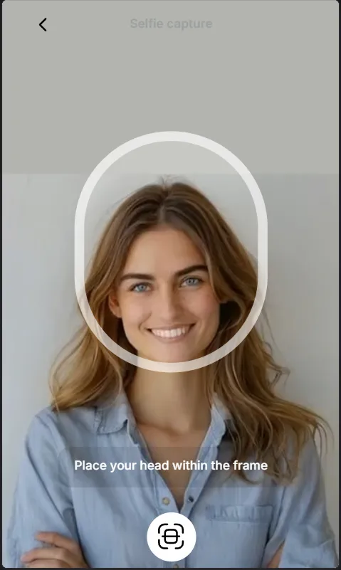 The selfie capture screen, with an oval frame for the face.